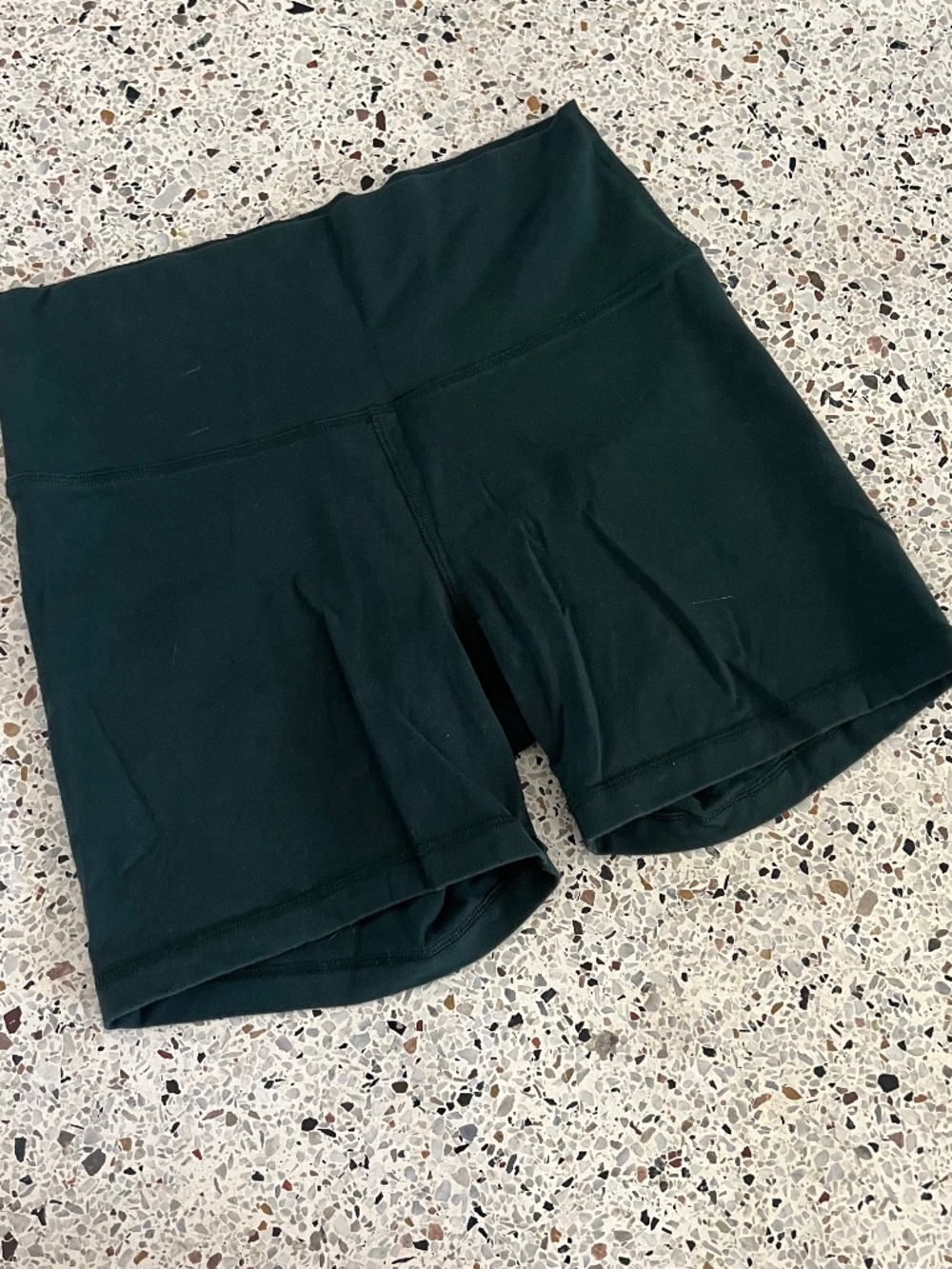 TNA Aritzia dark green biker shorts size large